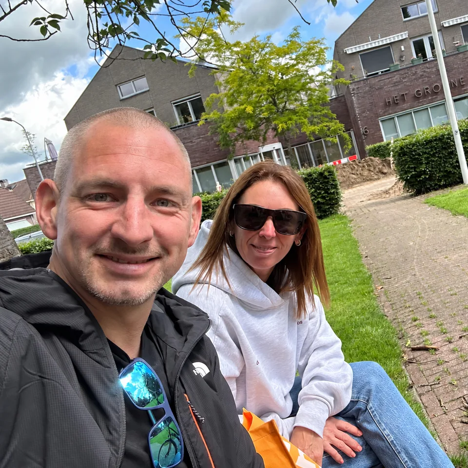 Mark and Keely smiling together on a bike ride break