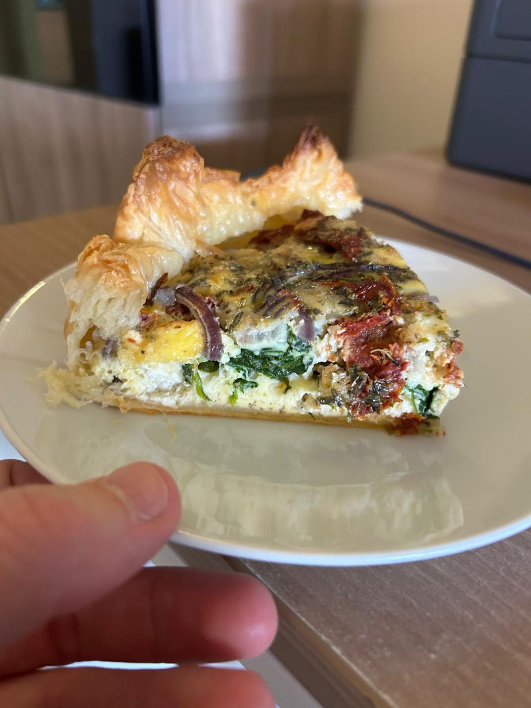 A slice of vegetable tart